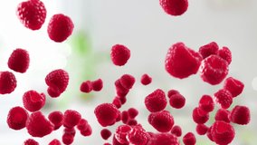 Flying of Raspberry in Kitchen Background - Powered by Shutterstock - Get 15% off with code: PIKWIZARD15