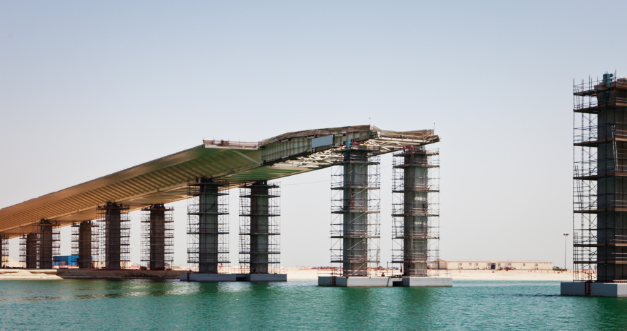 Timelapse of bridge construction with incremental launching of the deck above water