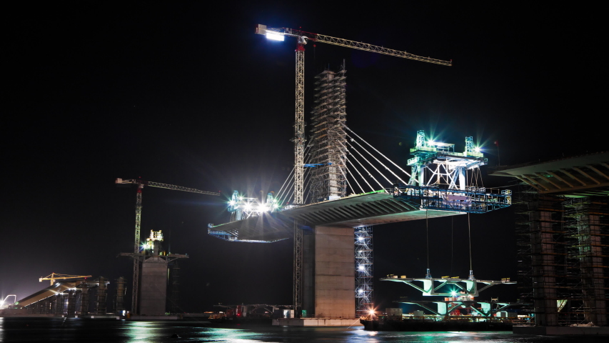 night timelapse bridge segment heavy lifting Stock Footage Video (100% ...