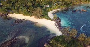 4K Aerial View to the Green Trees and Crear Blue Water of the Mahe Island in the Heart of Indian Ocean, Seychelles