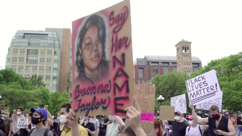 NEW YORK - JUNE 5, 2020: Breonna Taylor tribute - say her name sign at Black Lives Matter rally in Washington Square Park, New York City, NYC.