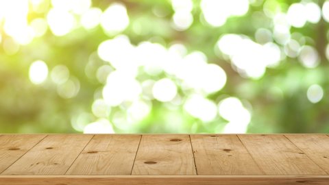 Top wood table and bar, wood texture on green nature tree bokeh background.