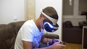 man plays video game in vr system