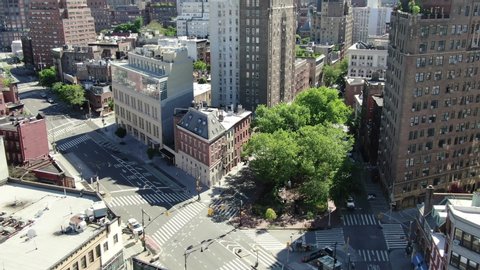 New York, NY / USA - June 3, 2020 : Greenwich Village during the Pandemic Lockdown Aerial by drone, COVID19, Shelter in Place, Corona Virus, During a sunny day, No cars on the street. June 2020. On 7t