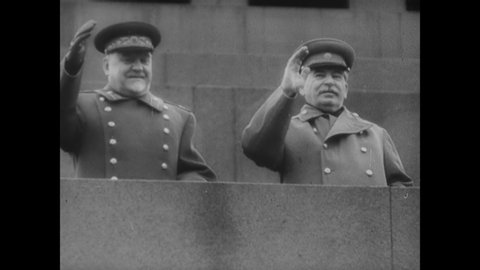 CIRCA 1953 - Joseph Stalin waves from the balcony of a tall building in Moscow, Russia.