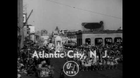 CIRCA 1949 - Miss America contestants ride on parade floats through Atlantic City, New Jersey ahead of the competition.