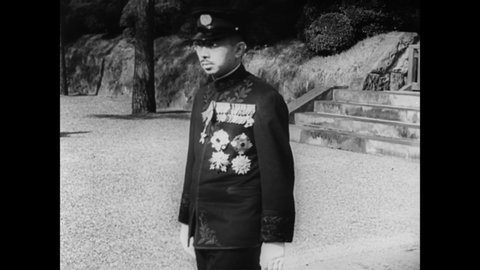 CIRCA 1945 - Emperor Hirohito visits the tomb of his father Yoshihito by Mount Fuji in a religious ceremony to tell him that the war has been lost.