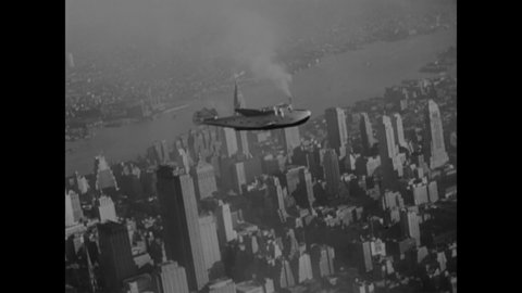 CIRCA 1939 - Passengers board the Yankee Clipper in Port Washington, New York, and the seaplane takes off and flies over New York City skyscrapers.