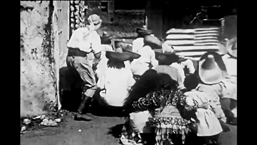 CIRCA 1913 - Spanish soldiers battle a ragtag militia of Filipino men.