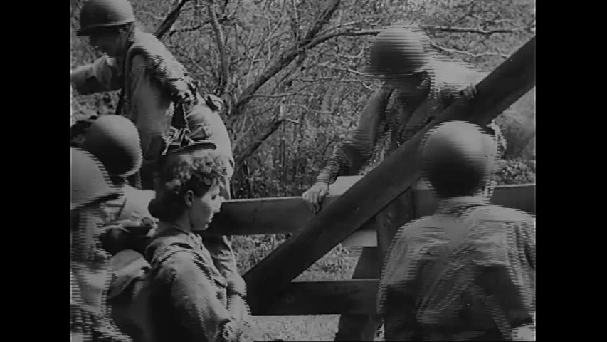 CIRCA 1945 - US Army nurses help construct field hospitals. Royalty-Free Stock Footage #1053963656