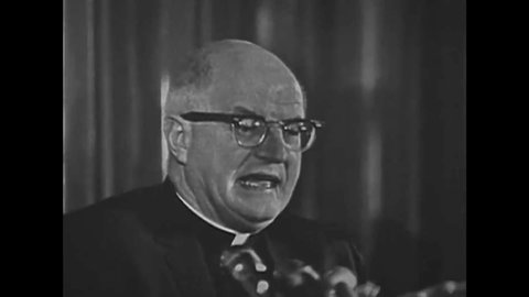 CIRCA 1960s - Father Raymond De Jaegher, a Roman Catholic priest, testifies about Communist executions, in 1969.