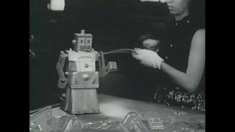 CIRCA 1950s - Robert the Talking Robot, a remote-controlled toy, is assembled in a factory, in a television commercial, in 1955.