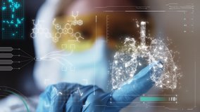 Doctor analyses patient lungs and health indicators using augmented reality holographic display interacting with a virtual interface. Concept of future digital technology. Medical mask, coronavirus - Powered by Shutterstock - Get 15% off with code: PIKWIZARD15