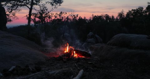 Camp fire burning on a mountain on midsummer night