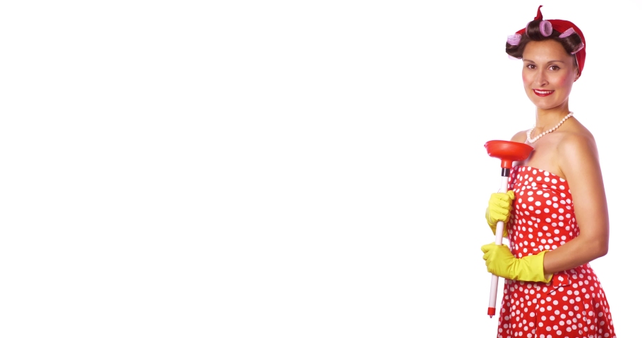 Funny housewife in pin up style with a perfect hair and a make up. Retro woman in a red dress and a yellow household gloves with a cleaning accessory. Isolated on white background	