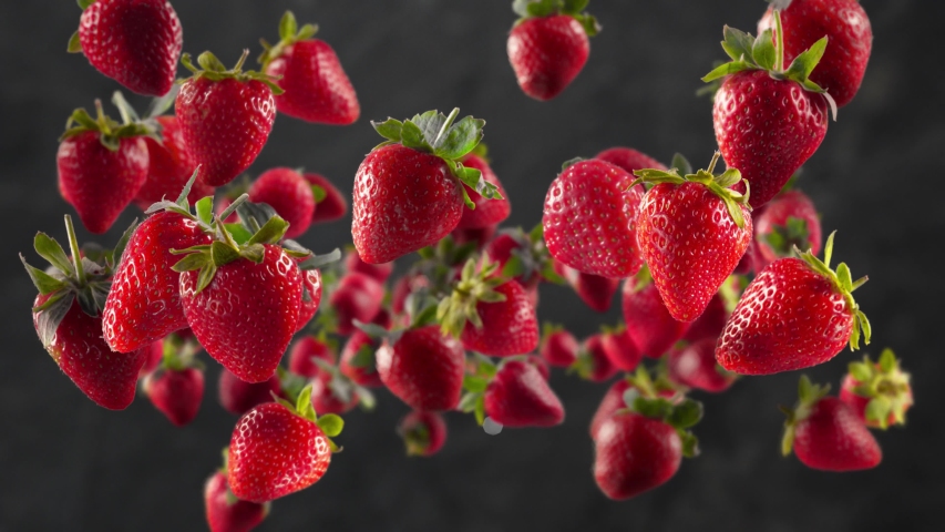 Flying of Strawberry in Dark Kitchen Background | Shutterstock HD Video #1054004819