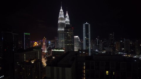 Kuala Lumpur, Malaysia - December 1, 2019: 4k establishing cinematic b-roll shot of night scene at Kuala Lumpur city skyline.