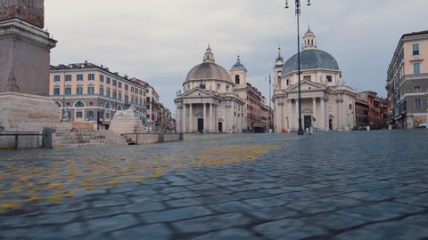 Walking at quiet Piazza del Popolo square, on a overcast day in Rome - Tracking shot low to the ground