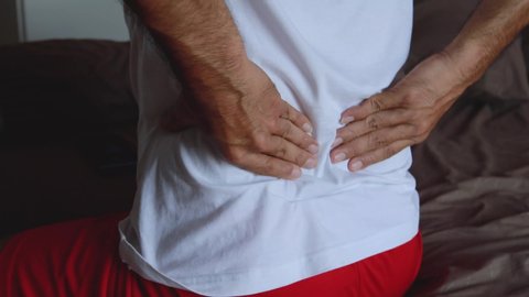Close up man with low back pain
