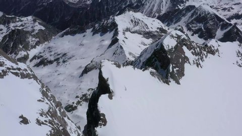 Spectacular view above white snow covered Glacier d'Ossoue, French Pyrenees, circle aerial