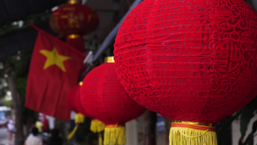 Chinese red lantern for celebrate spring festival. Close-up of red paper lantern decoration swaying in the wind.
