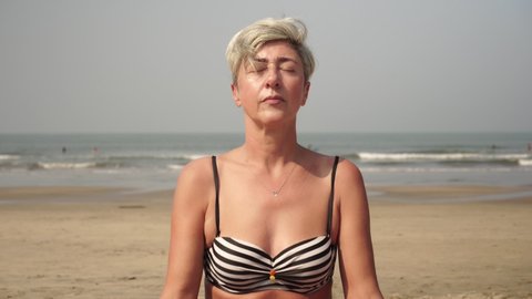 Mature Woman Senior Citizen Meditates On Stock Footage Video (100%  Royalty-free) 1054037390 | Shutterstock