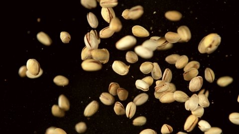 Super slow motion of flying pistachios nuts collision. Filmed on high speed cinema camera, 1000 fps.