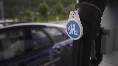Hydrogen Car arrives at hydrogen gas station