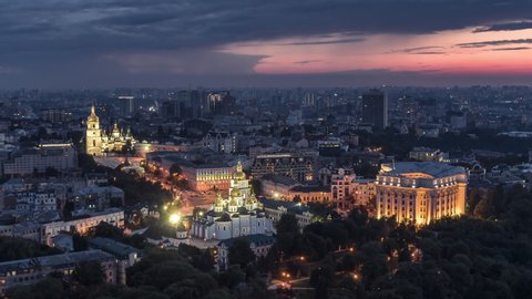 Cinematic Aerial View Shot of Kiev Kyiv, St. Sophia's Cathedral, St. Michael's Monastery, Ukraine at night evening dusk