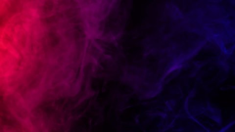 Smoke on a black background. Bright colorful smoke. Blue, raspberry, red, purple background. Beautiful abstract background. smoke texture. Pattern.
