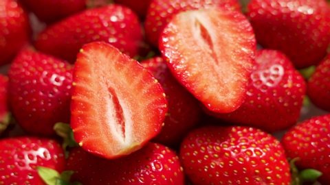 Juicy Ripe Strawberries, Decorated With Cut In Half Strawberries, Summer Berries. The Concept Of Healthy Vegan Food.