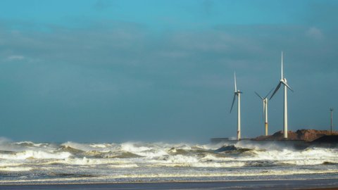 SLO MO WS Wind turbines on sea coast / Boulogne-Sur-Mer, Pas-De-Calais, France