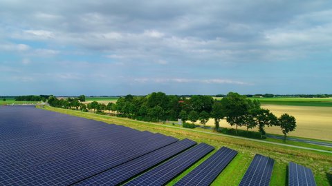 AERIAL WS Rows of solar panels in field / Emmeloord, Flevoland, Netherlands,Nature,Technology