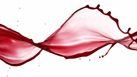 Super Slow Motion Shot of Red Wine Spiral Splash Isolated on White Background at 1000fps.