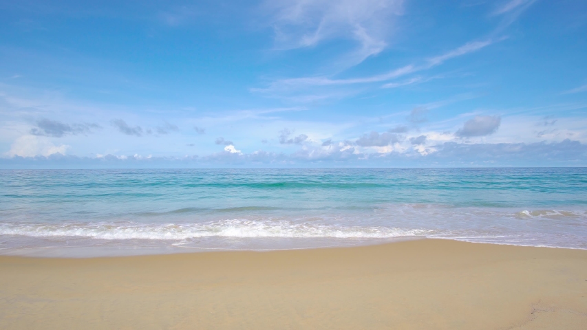 Phuket beach sea Thailand. Landscapes view of beach sea sand and sky in summer day. Beach sea space area. At Karon Beach, Phuket, Thailand. On 9 May 2020 | Shutterstock HD Video #1054119680