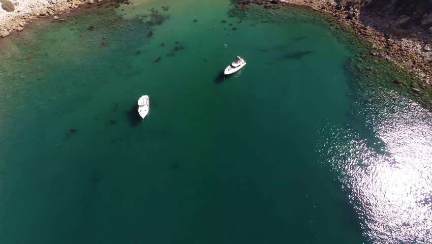 Santa Cruz Island, yacht. Flying over the boats in the water Santa Cruz Island. Pacific Ocean. California.