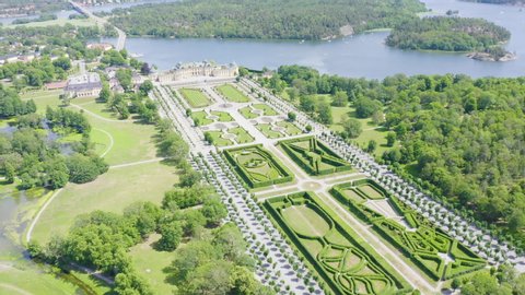 Dolly zoom. Stockholm, Sweden - June 23, 2019: Drottningholm. Drottningholms Slott. Well-preserved royal residence with a Chinese pavilion, theater and gardens, Aerial View, Departure of the camera