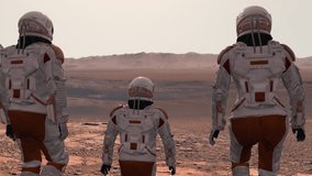 Family colonists immigrants to Mars, a man, a woman and a child admire the Martian landscape, the city and the spaceship. Exploring mission to mars. Elements of this video furnished by NASA.