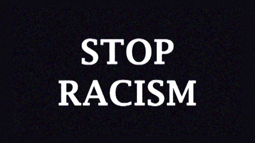 4K. Glitch screen saver with text STOP RACISM for news on tv. Protests against racism. The concept of the global problem of racism in the world.