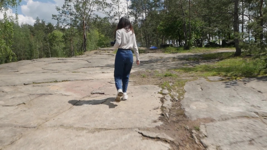 Forest Green Moss Trees. Silhouette Human Legs In White Shoess. Walking Hiking