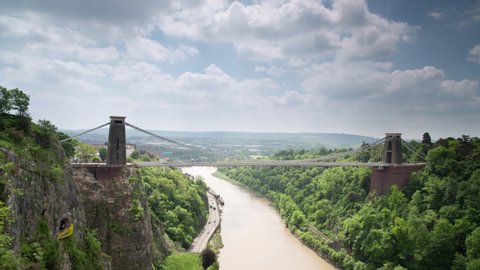 Timelapse of clouds moving in sky above Clifton suspension bridge over the River Avon, Bristol, England, UK