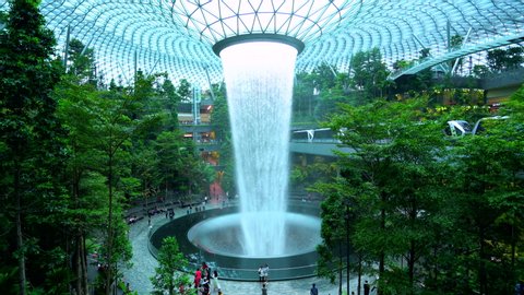 Changi Airport - Singapore - July 14: Waterfall at Shopping mall Jewel in Changi Airport connecting to Terminal 1 Arrival and Terminal 2,3 through linked bridges on July 14,2019 Singapore 