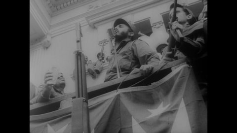 CIRCA 1959 - Fidel Castro addresses large crowds from the Presidential Palace in Havana seeking to justify the swift execution of Batista leaders.