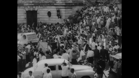CIRCA 1959 - A celebration of Fidel Castro's victory over Batista takes place in the streets of Havana, Cuba, and turns destructive.
