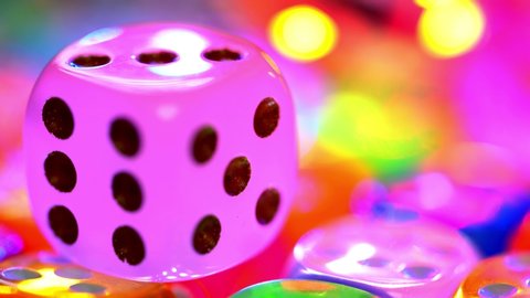 Multicolored dices.  Red, blue, orange, green, pink cubes.  Gambling                                                                                            