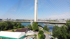 Drone video of Ada bridge, a cable-stayed bridge over the Sava river and important landmark of Belgrade, Serbia