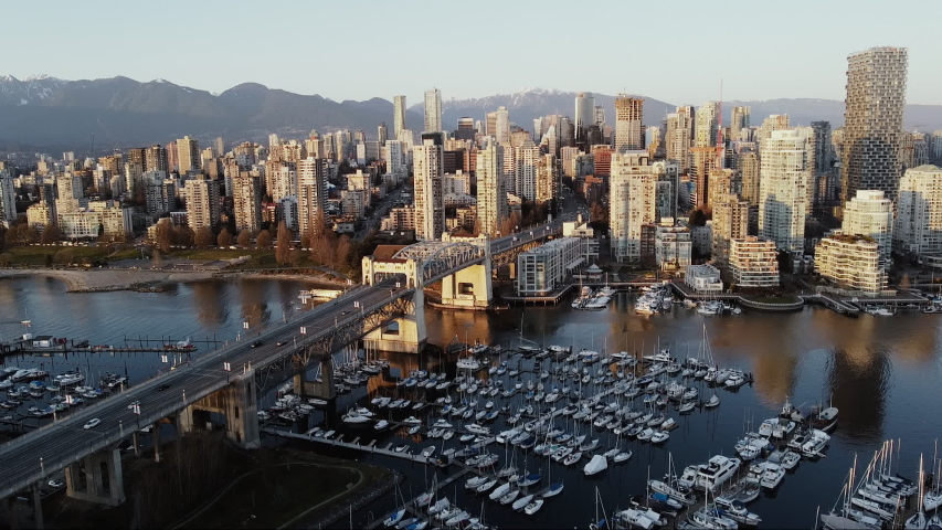 Vancouver downtown with the bridge and sailing ships in front