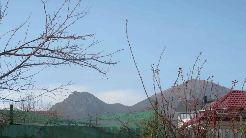 Timelaps of mountains. View from village in valley.