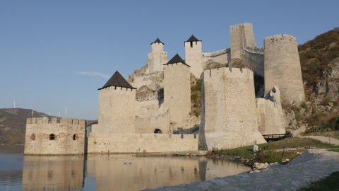 Slow pan on towers of Golubac fortress on Danube river 4K video