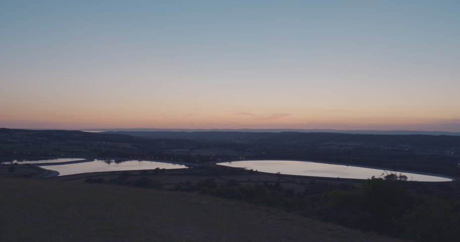 Reservoirs in countryside at dusk